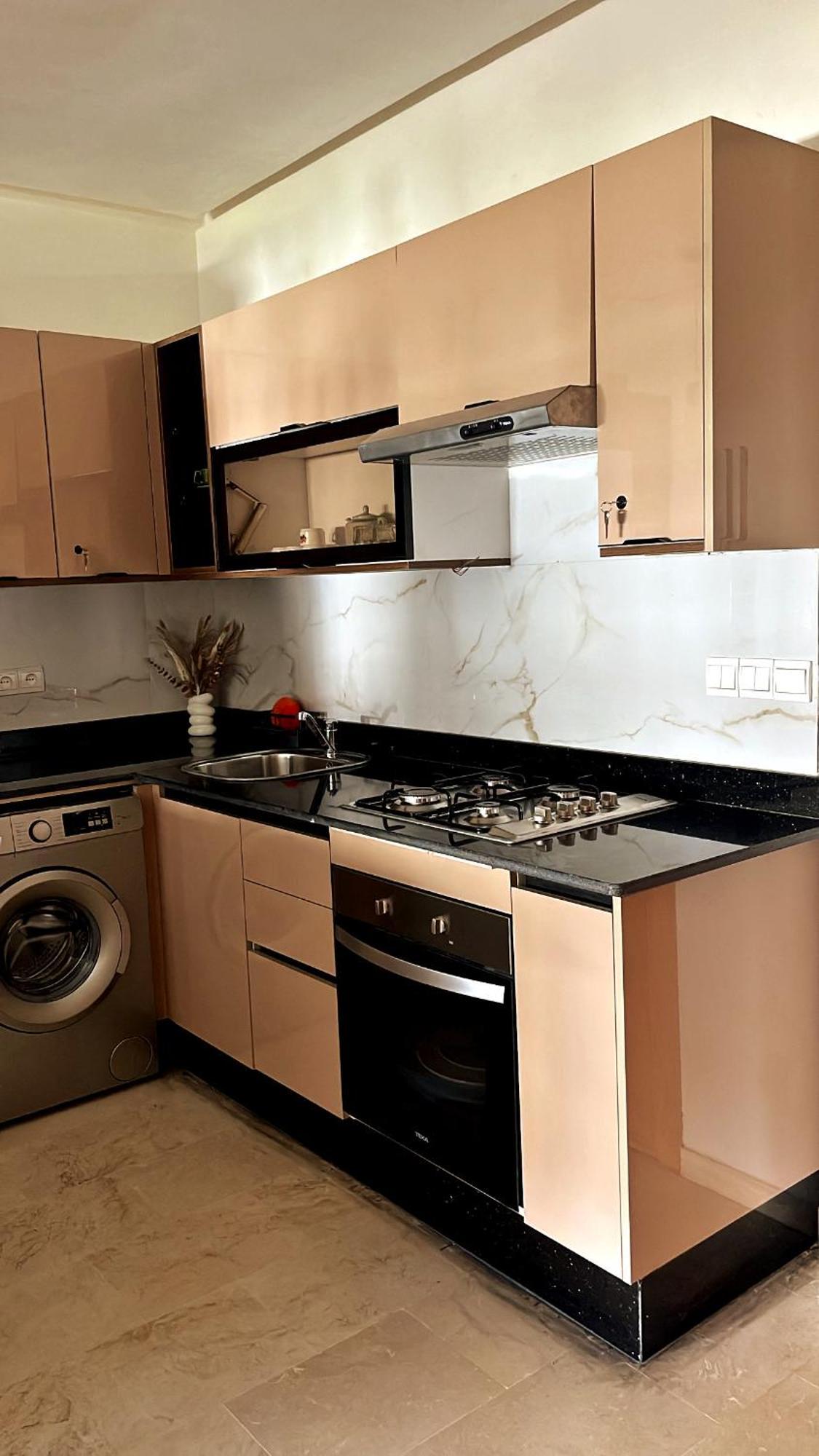 Elegant Appartement Avec Un Acces Piscine Jardin Parking Sous-Sol Et Wifi Haut Debit Fibre Optique Tangier Bagian luar foto